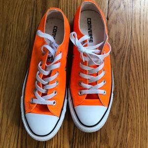 Bright orange converse shoes